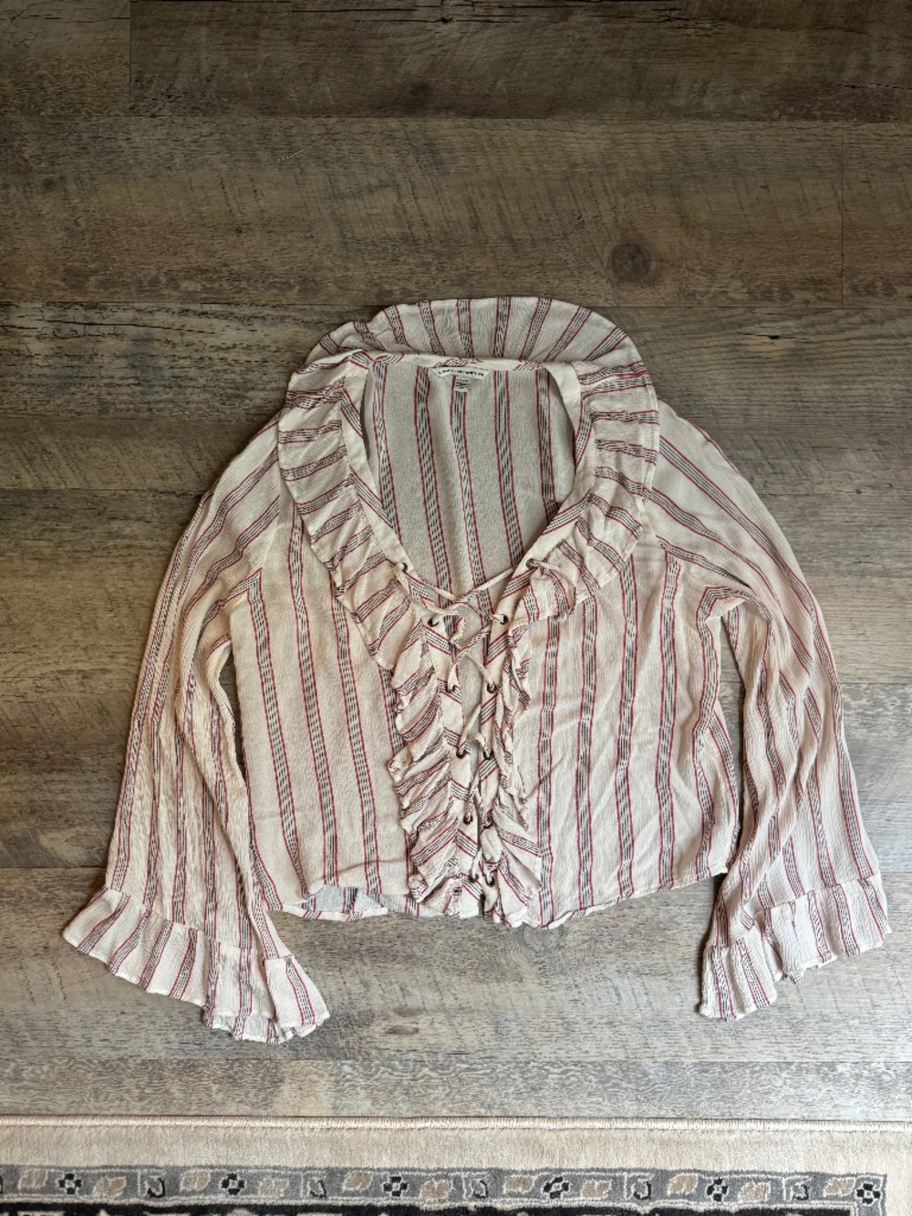 Ruffled striped front tie top